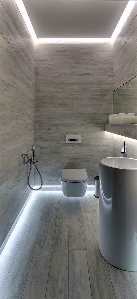 small narrow powder room with led lighting and floating toilet
