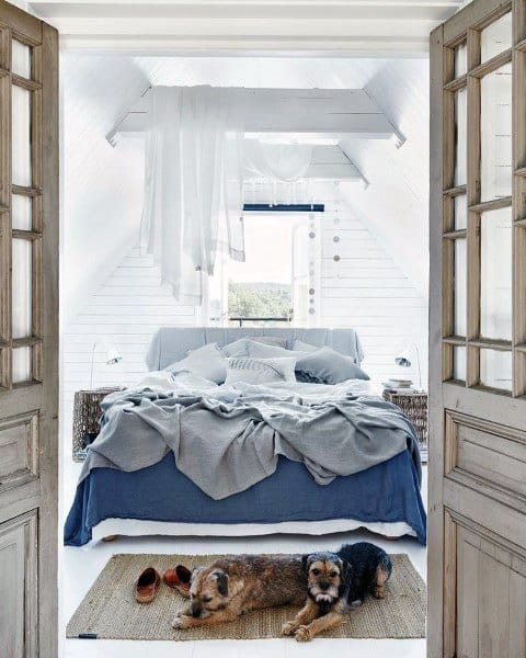 small attic bedroom with vaulted ceiling 