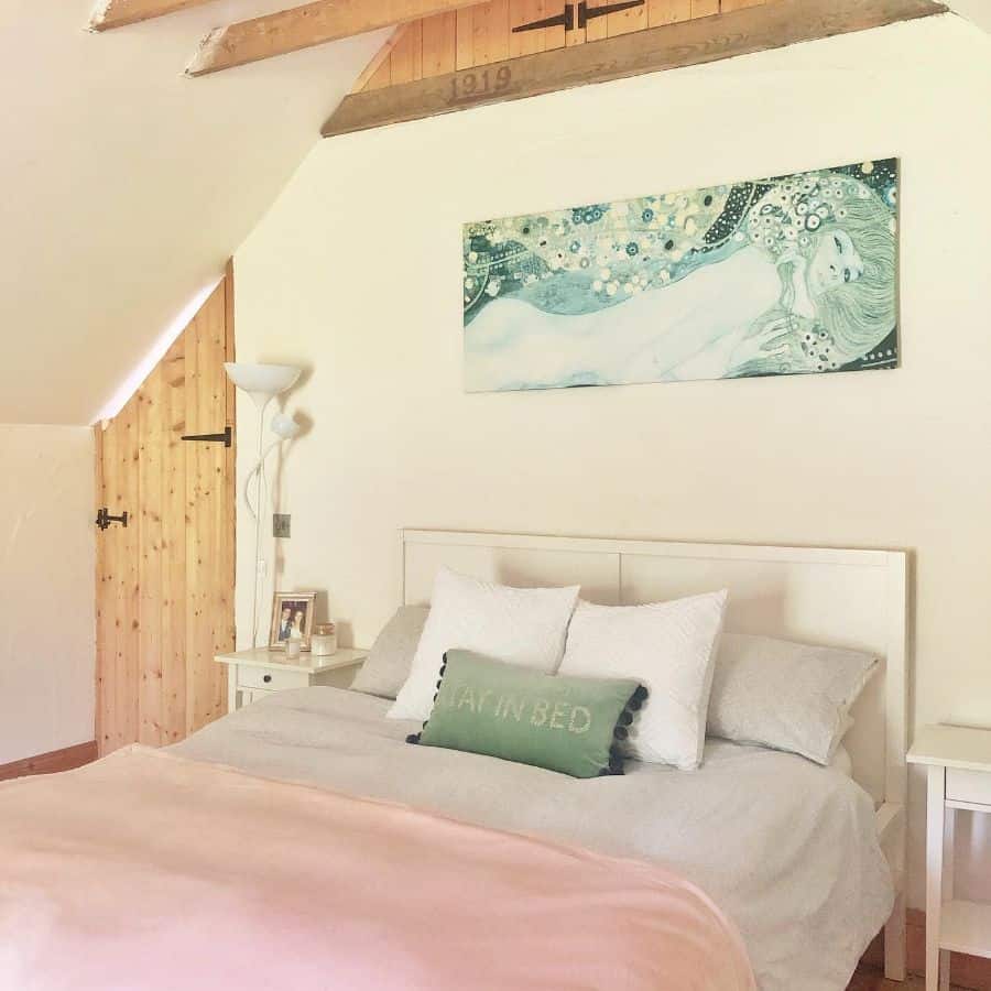 attic bedroom white bed wood door