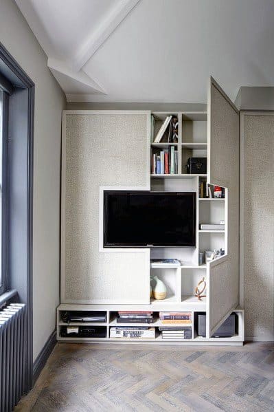 awesome built-in television wall with hidden bookcase shelves tv wall ideas