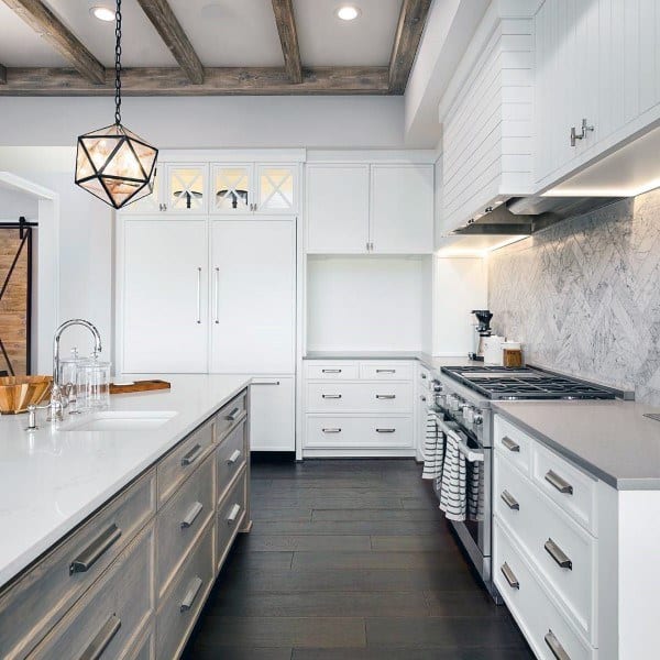 all white kitchen hardwood floors and pendant light 