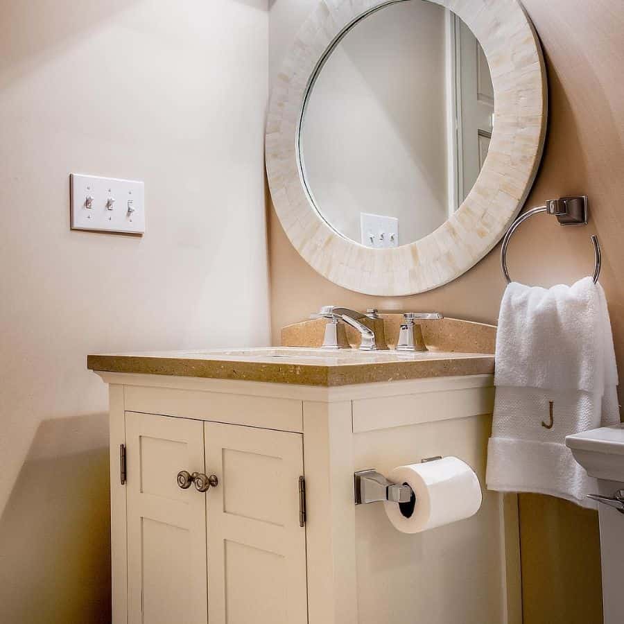 beige sink and mirror