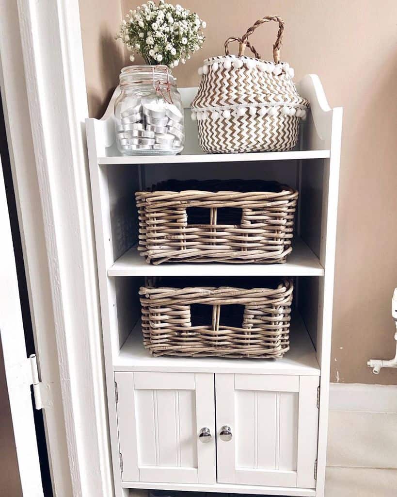 white shelving and wicker baskets