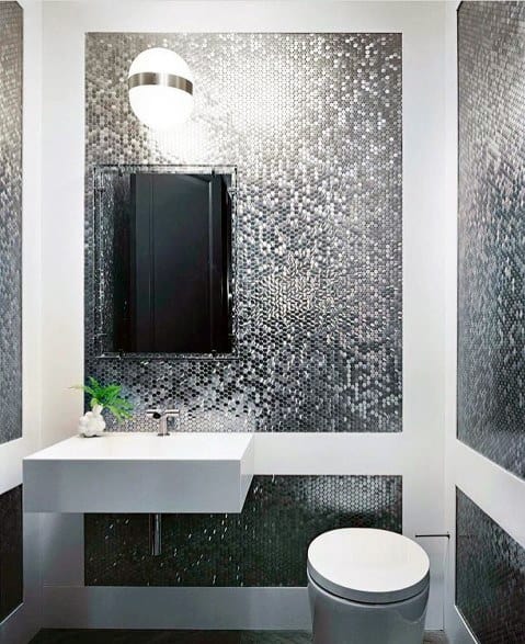 shiny silver mosaic tiles in powder room
