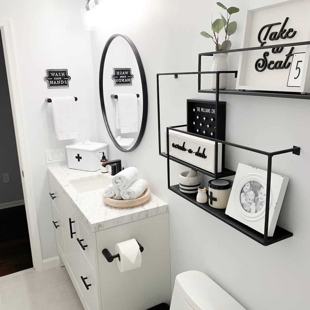 modern white bathroom with black accents