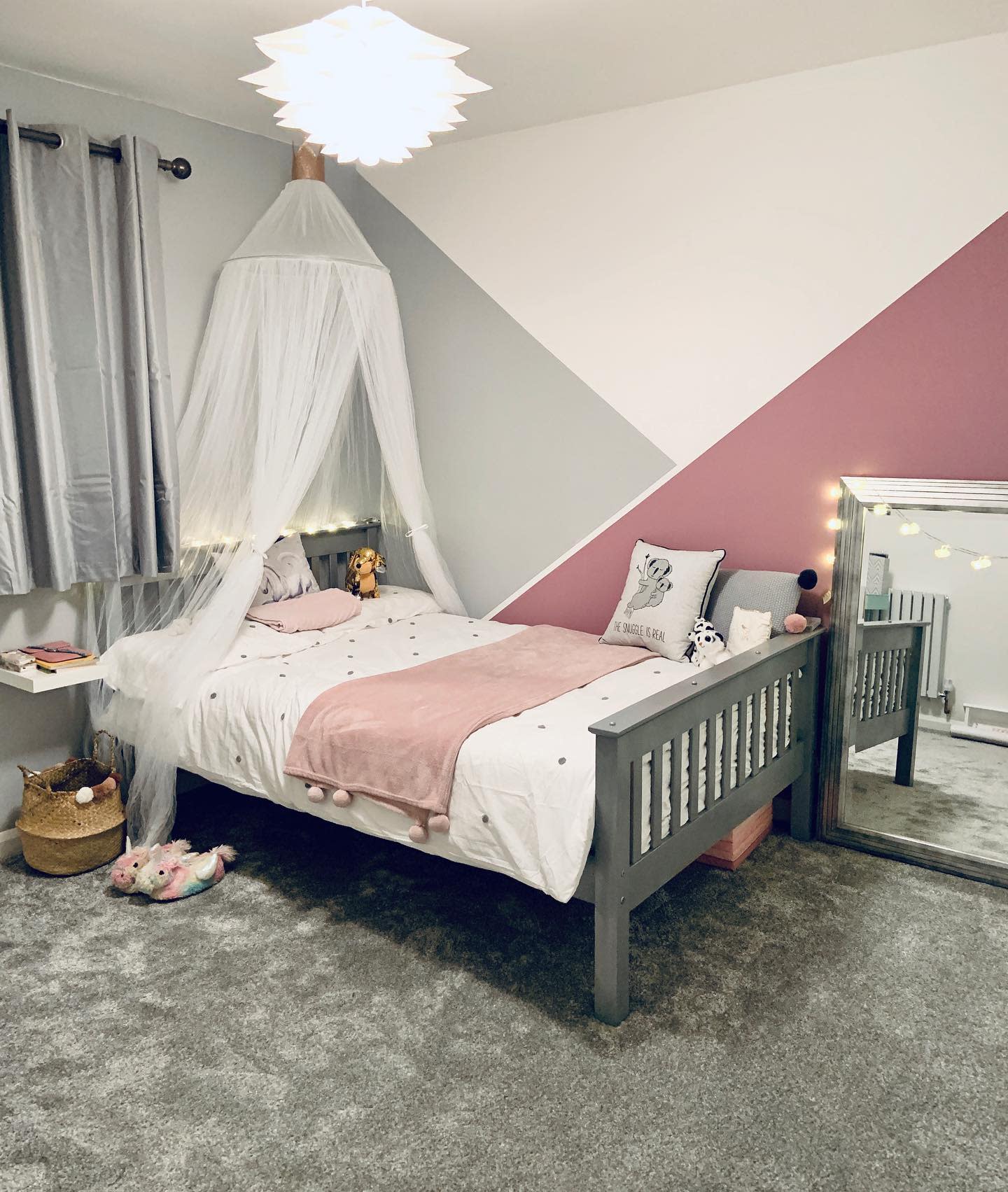 white gray pink triangle painted bedroom wall 