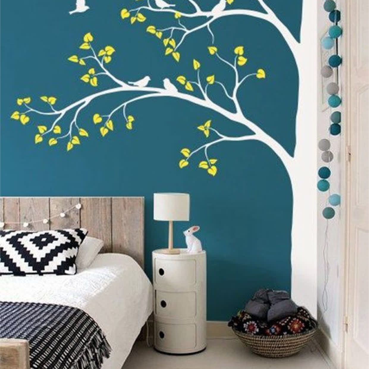 bedroom painted wall with tree 