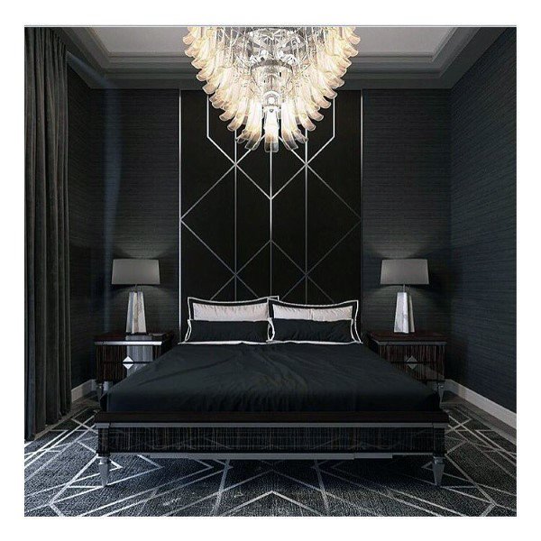 modern luxury black small master bedroom with chandelier