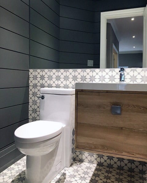 small powder room with pattern tiles 