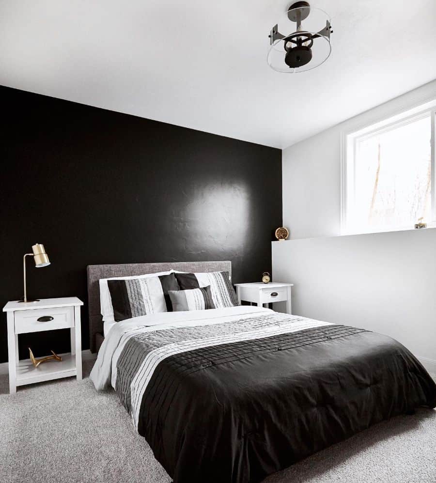 monochrome bedroom black feature wall