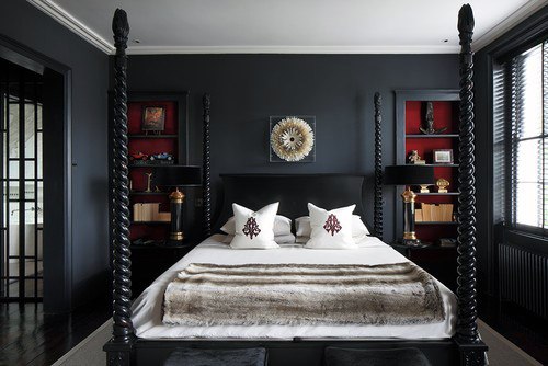 dark small master bedroom with four post bed