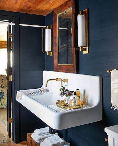 blue shiplap walls in small master bathroom 