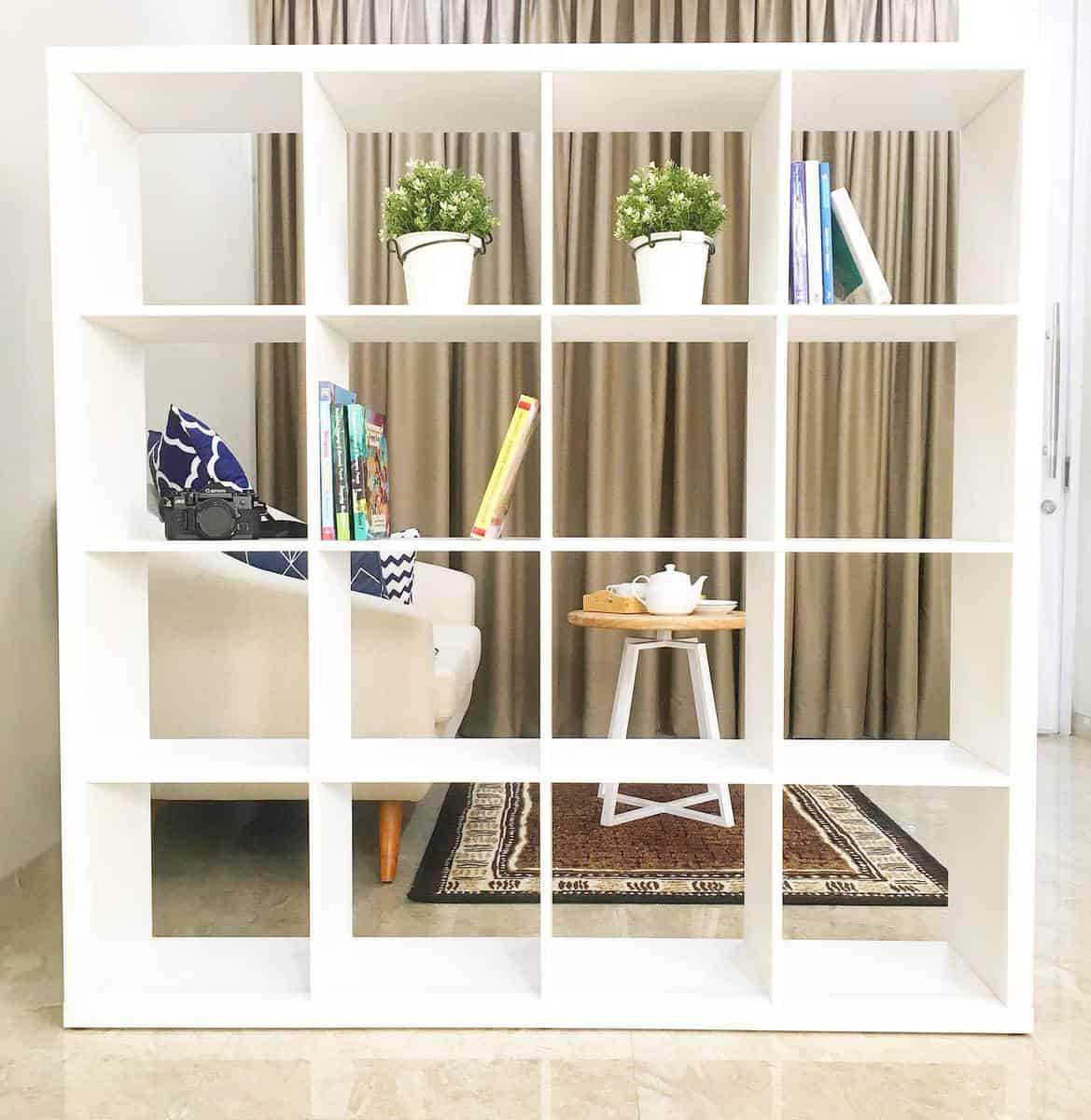 white temporary bookcase in small living space