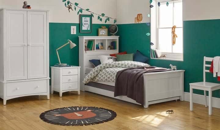 two tone green and white wall boys bedroom white bed frame cabinets and bedside table 
