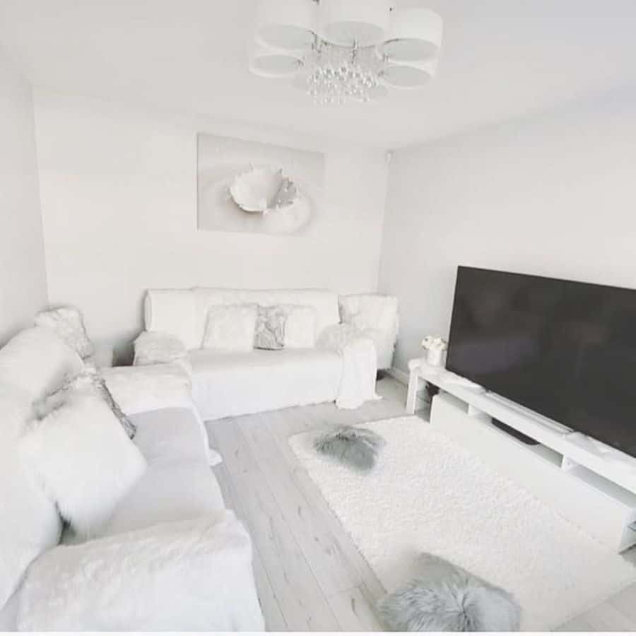 all white living room large tv screen