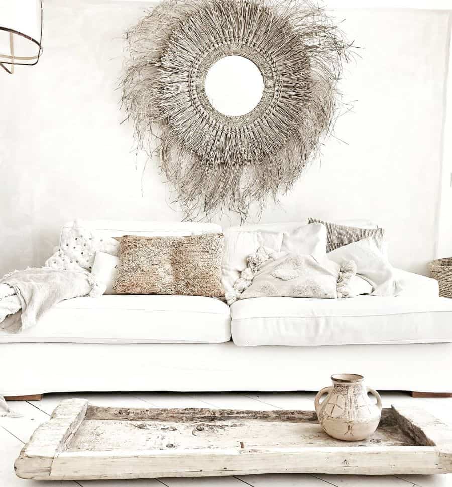 boho style white couch wall art mirror rustic tray 