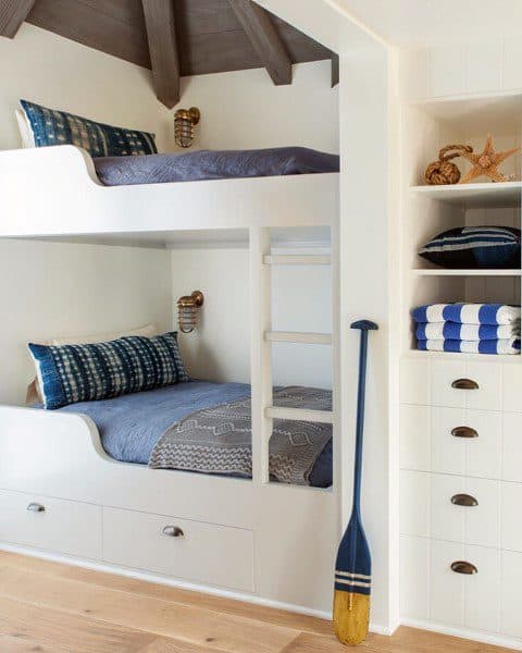white bunk bed with storage options 