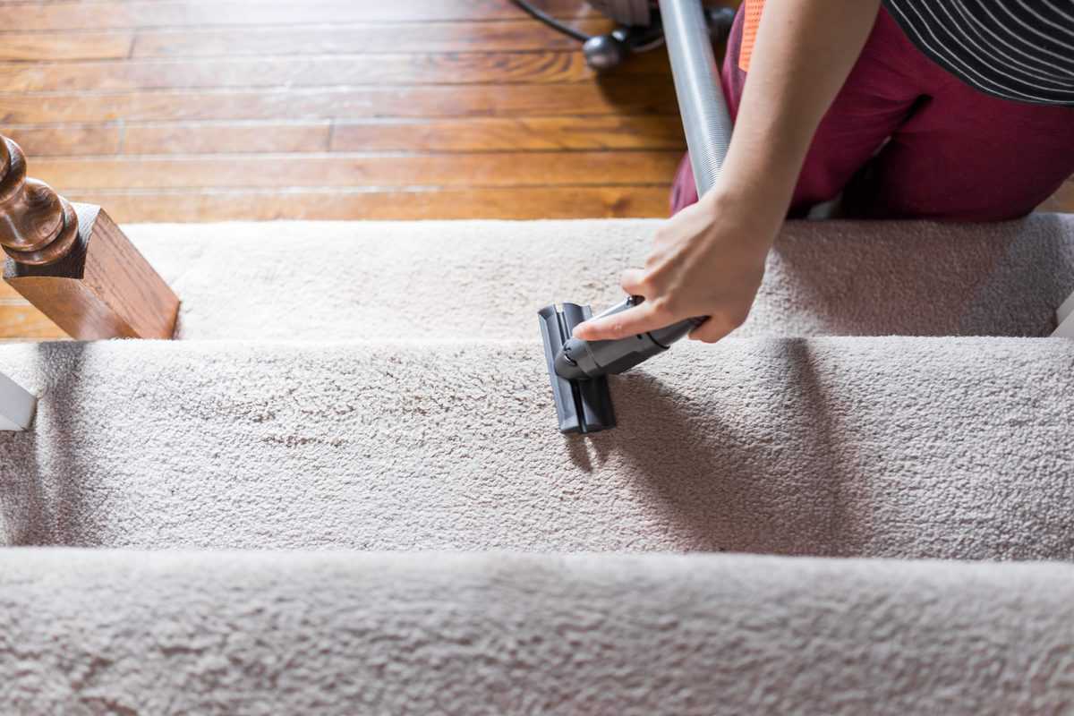 vacuuming carpet stairs 