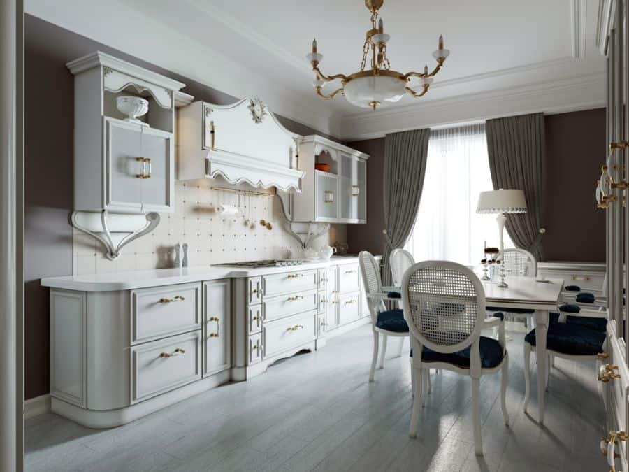 classic french kitchen white cabinets gold accents white table 
