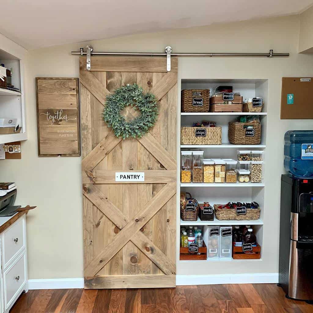 kitchen pantry with sliding wood barn door 