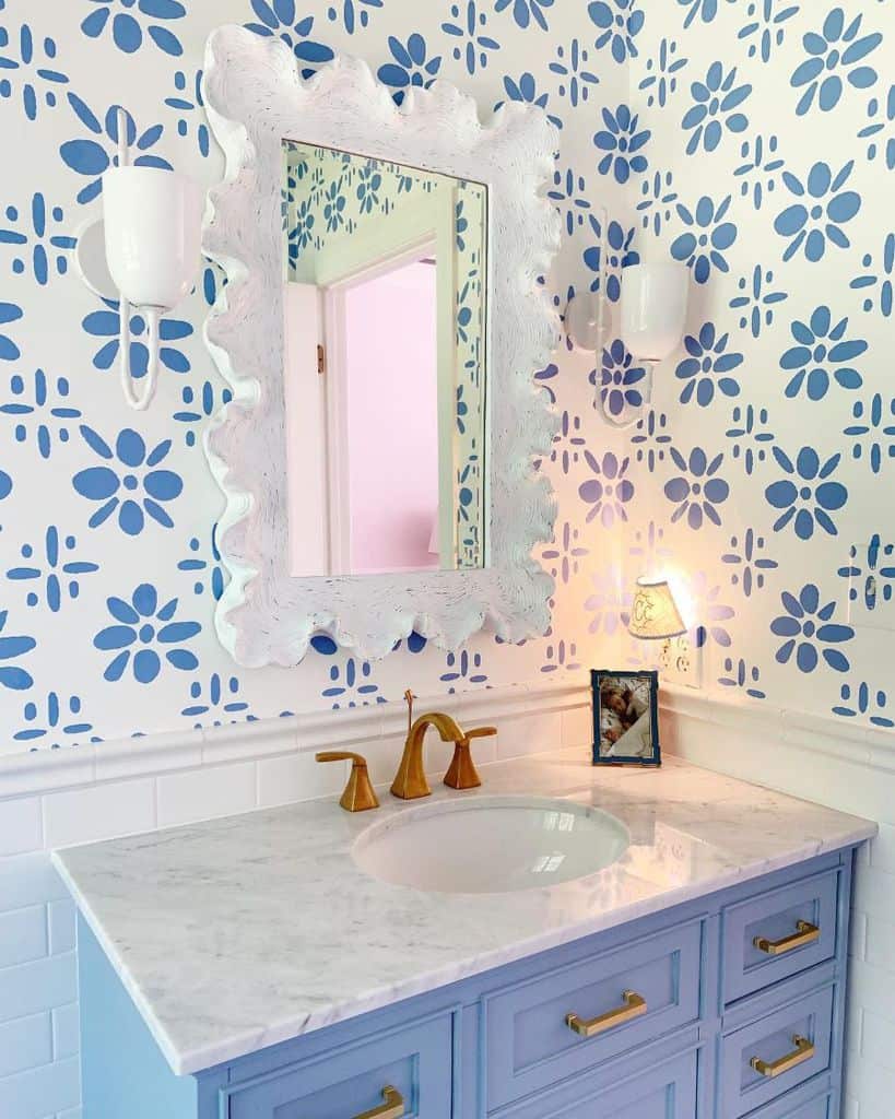 blue and white pattern wallpaper blue vanity marble countertop bathroom 