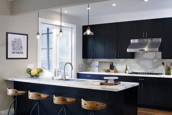 black kitchen cabinets white marble countertop wood stools