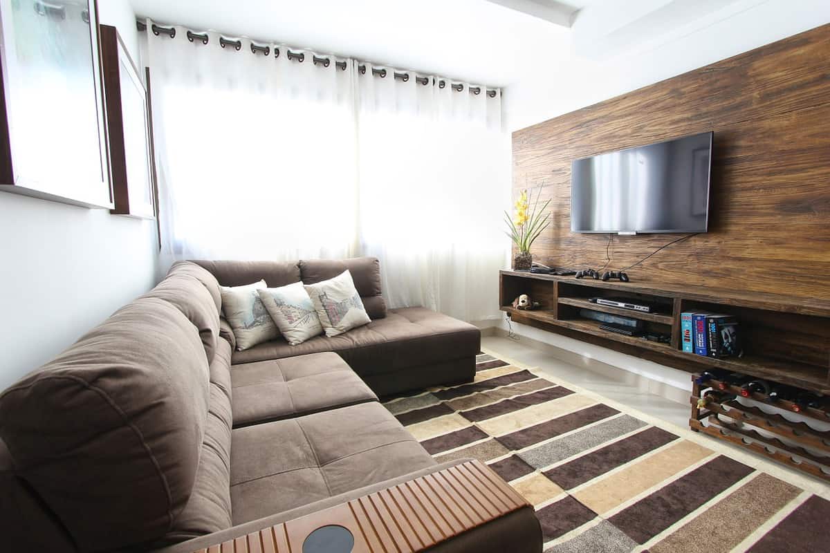 contemporary brown living room wood feature wall mounted tv
