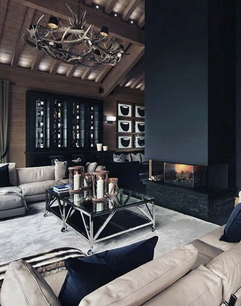 masculine living room fireplace cream sofa glass coffee table 