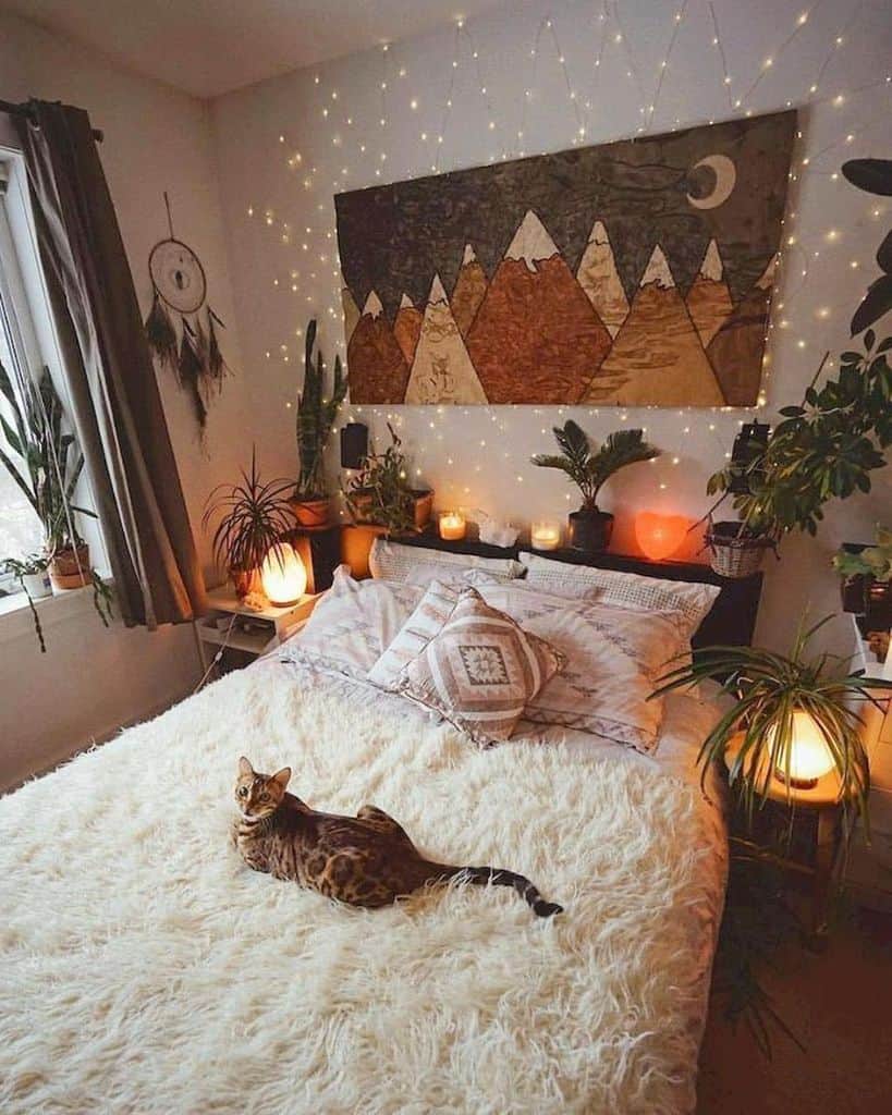 cozy boho bedroom mountain drawing wall art lights cat dreamcatcher 