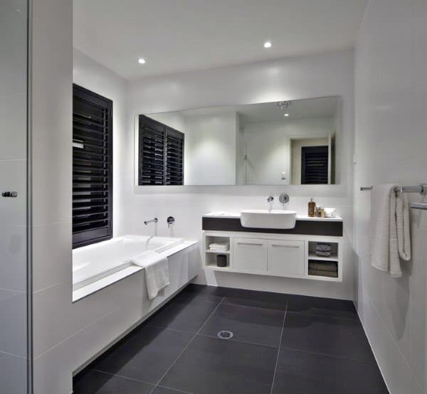 large white bathroom with big mirror