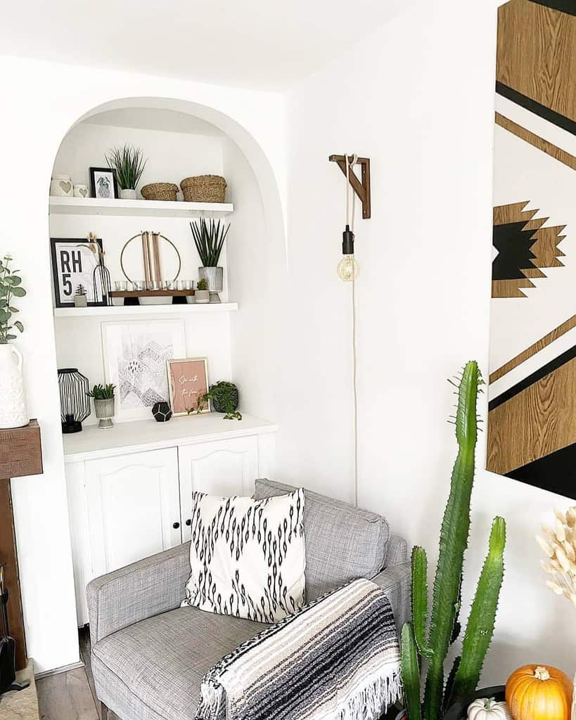gray sofa white living room cactus