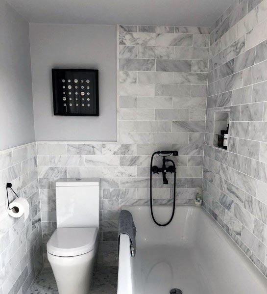 grey tile small master bathroom with tub