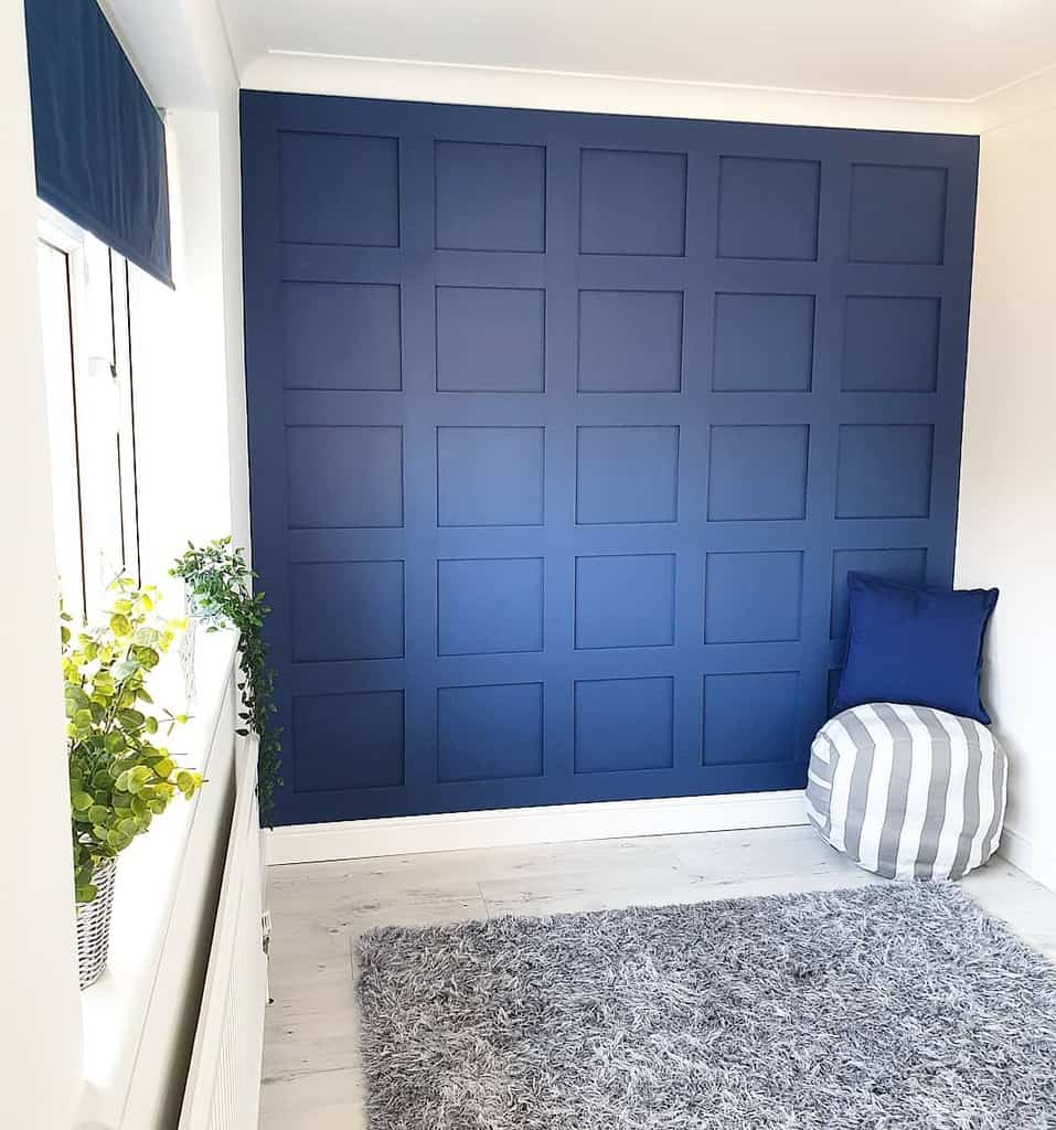 blue wall paneling living space 