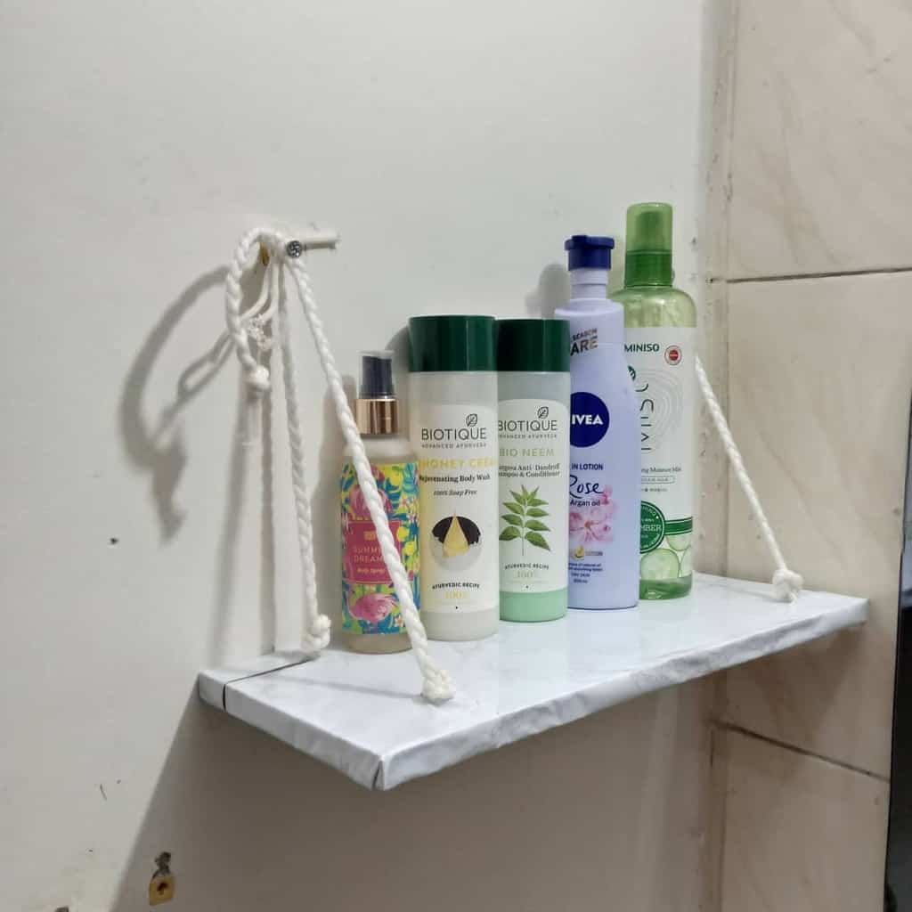 diy hanging shower shelf with bathroom products 