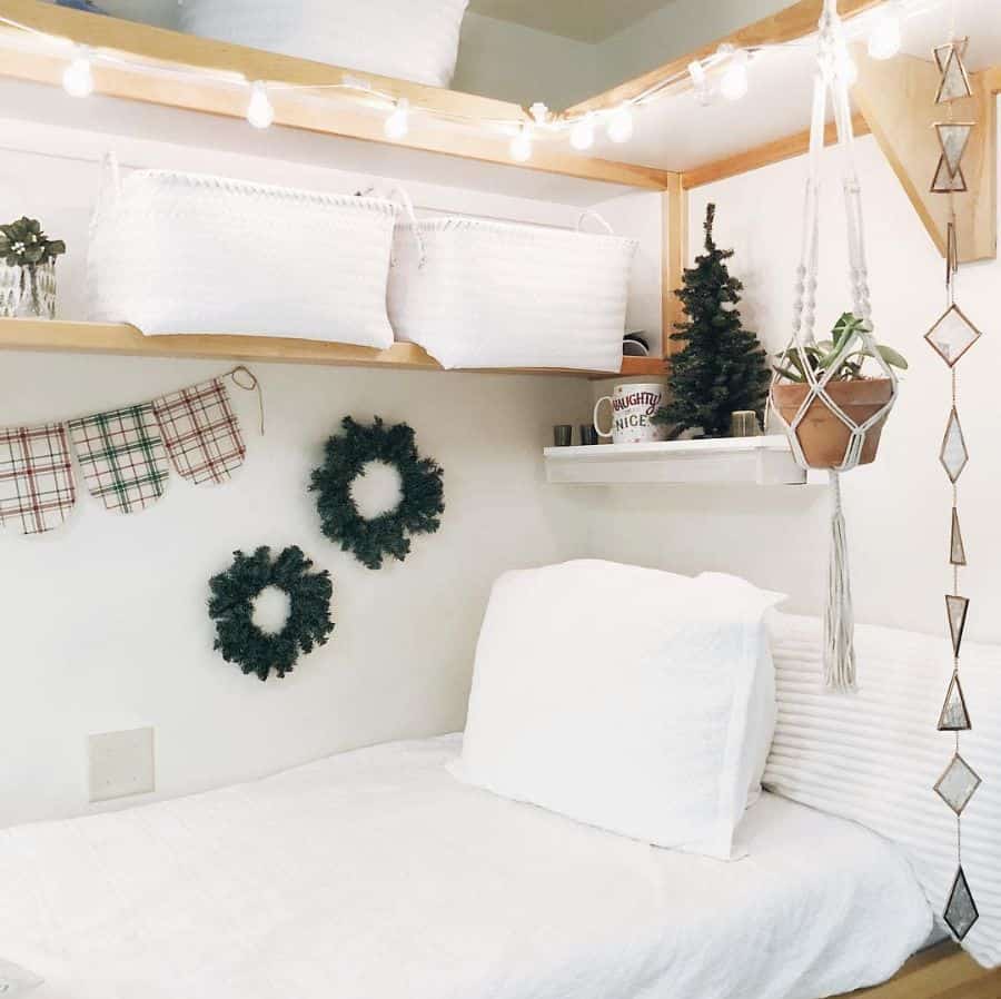 simple white bedroom wall shelves christmas tree hanging pot plant 