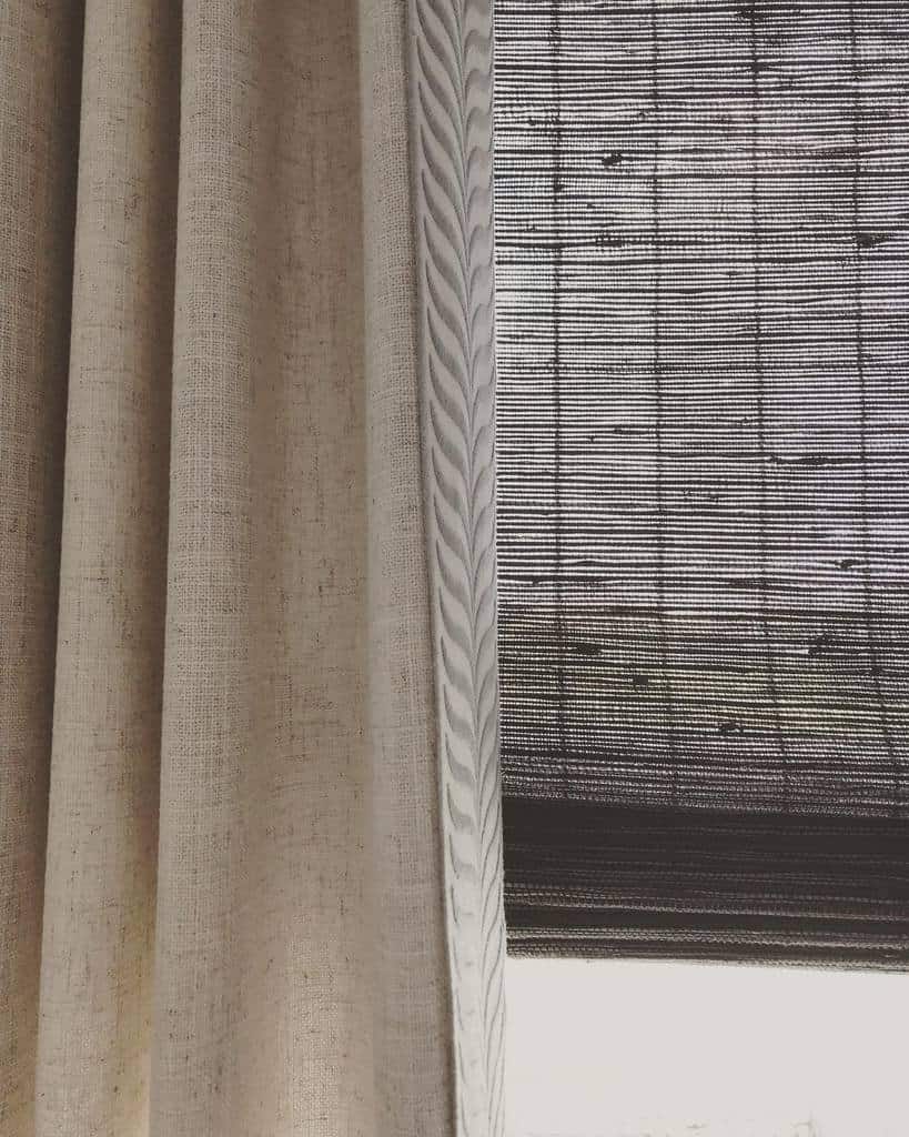 beige drapes and gray blind 