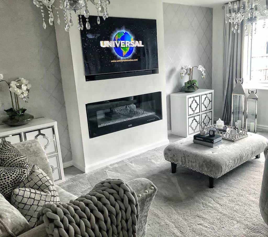 elegant gray and white living room electric fireplace wall mounted tv chandelier