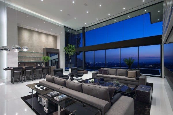modern luxury living room with wet bar and floor to ceiling windows
