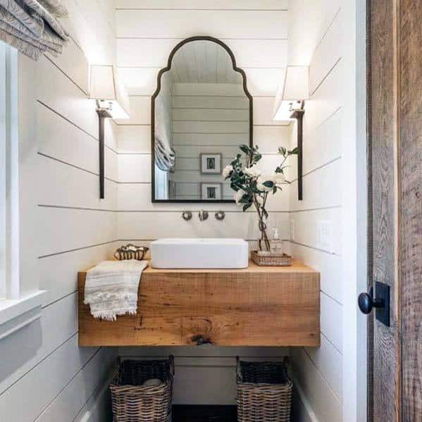 country style powder room with wood vanity 