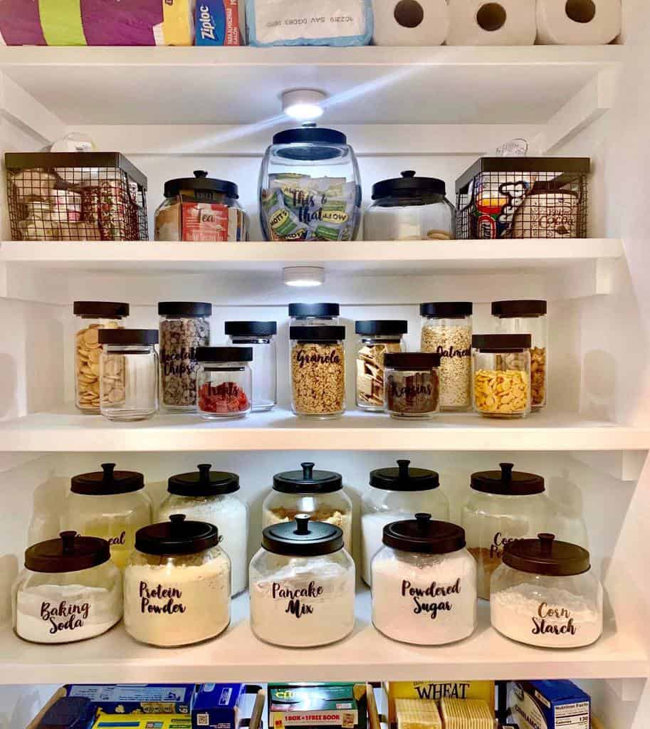efficient food storage shelves in kitchen cupboard