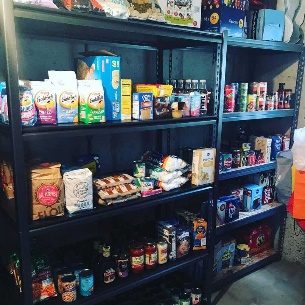 steel kitchen shelving unit holding food items