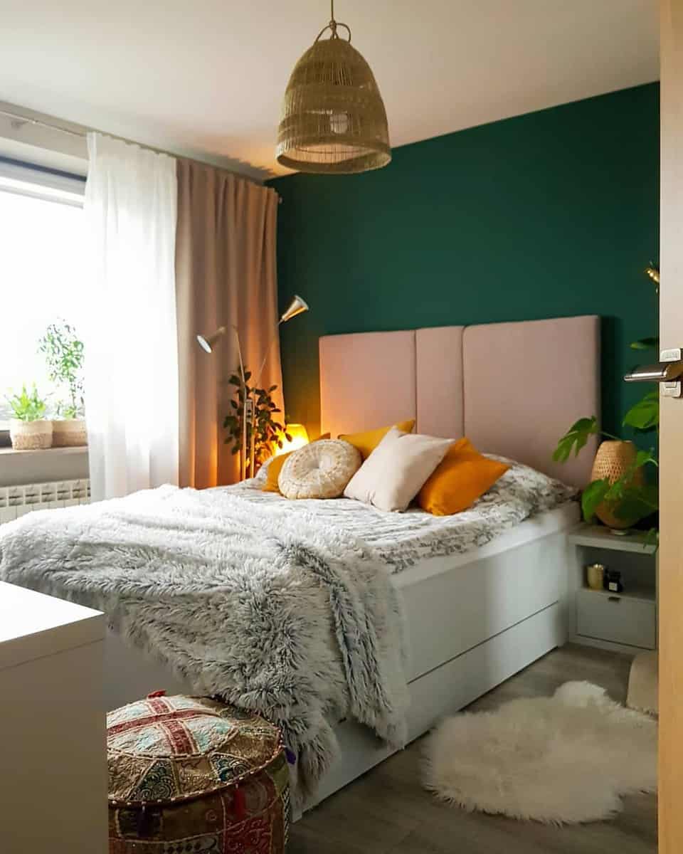 girls bedroom green accent wall modern bed gold lamp pot plants 