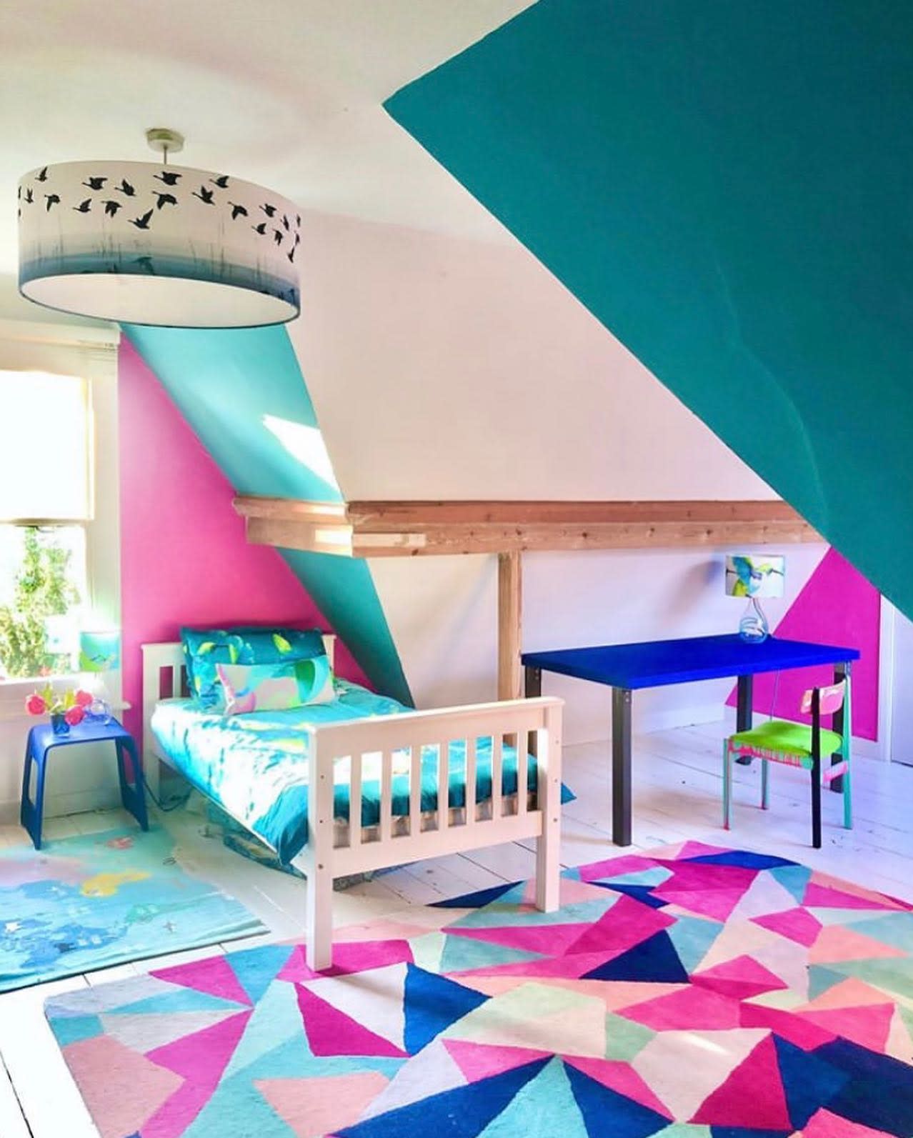 bright colored walls kids single bedroom blue desk 