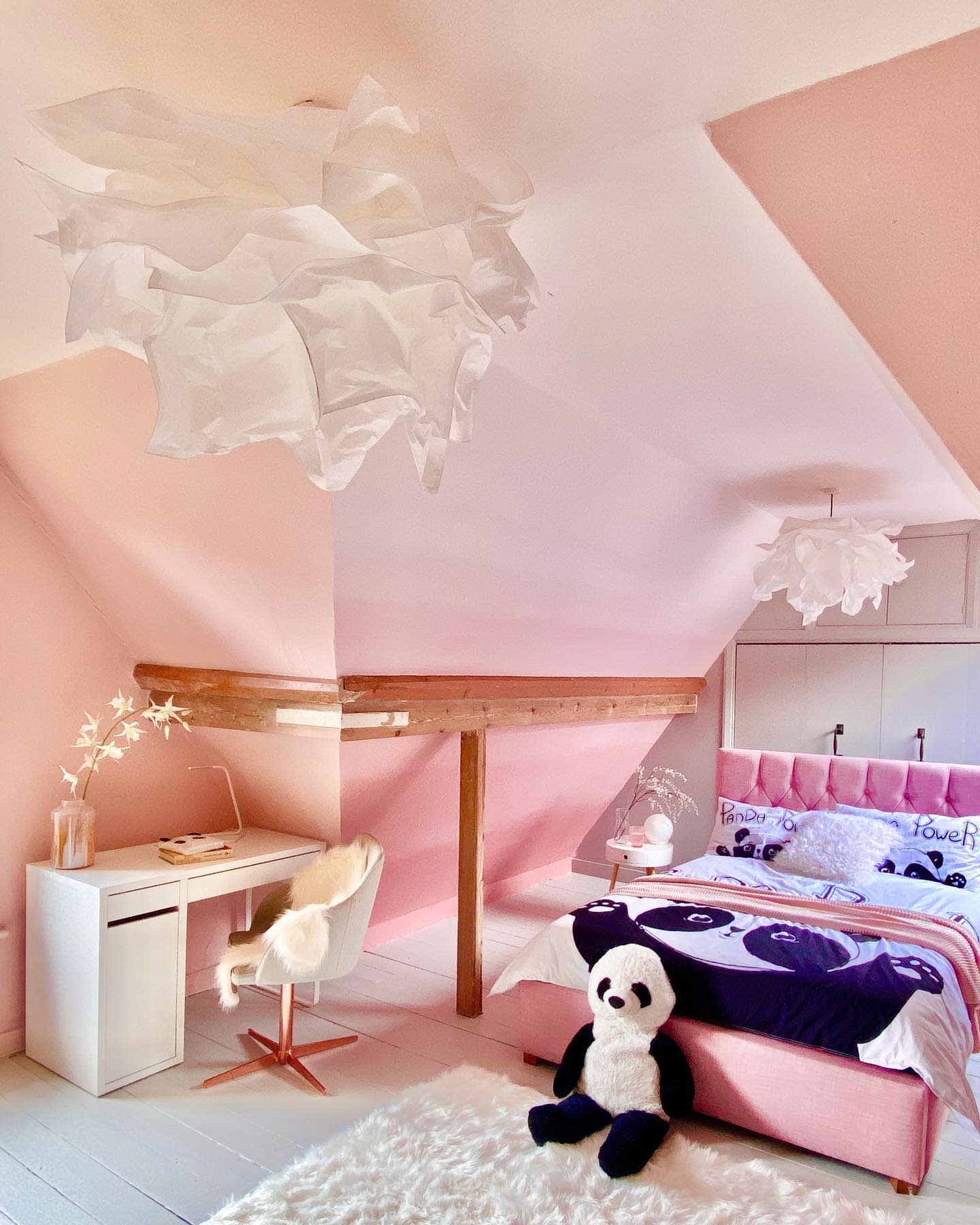 girls attic bedroom painted different shades of pink 