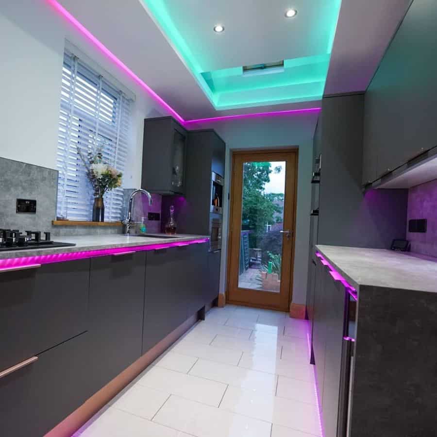 small gray kitchen with purple led lighting 