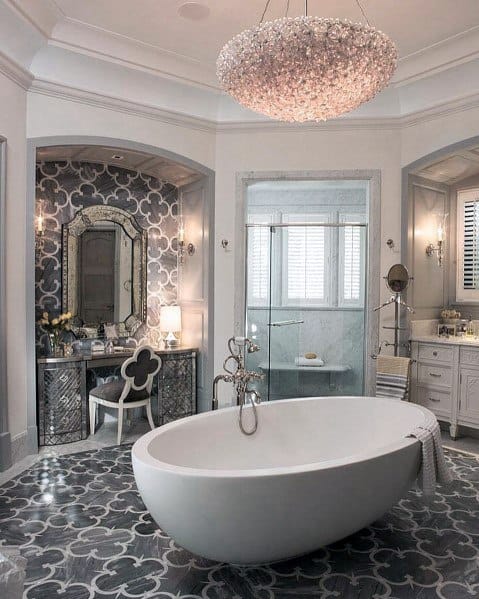 gray pattern tile flooring with white bathtub master bathroom