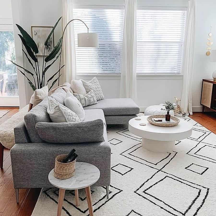 stylish living room gray sofa white coffee table pattern floor rug 