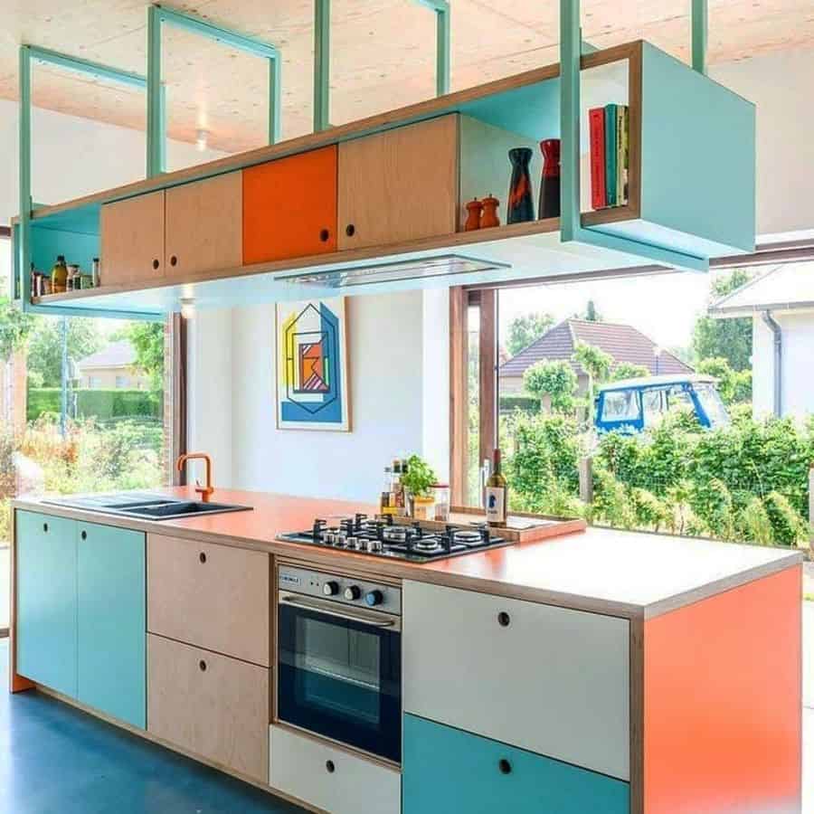 hanging shelving in blue and pink kitchen 