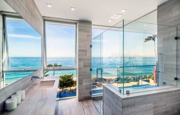 luxury master bathroom with walk-in shower and ocean view