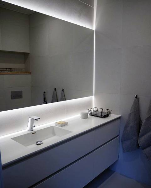 white bathroom with large mirror